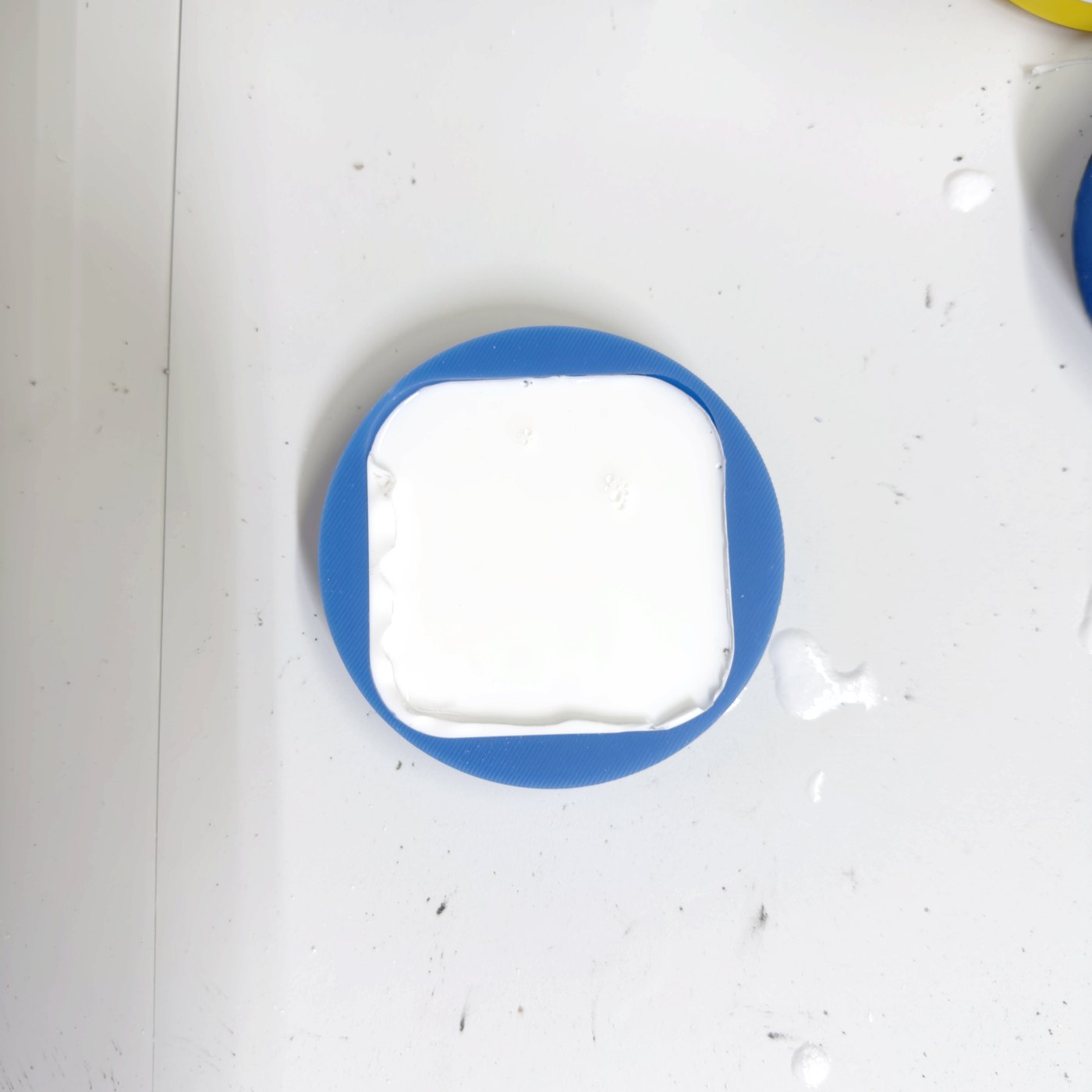 The white dome, just poured into its round mold.